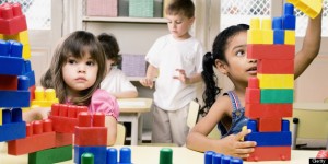 Here's Linda's kid playing with a kid at school who has a reduced immune system. Photo credit: www.huffingtonpost.com